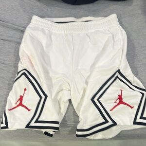 White shorts with Jordan logos